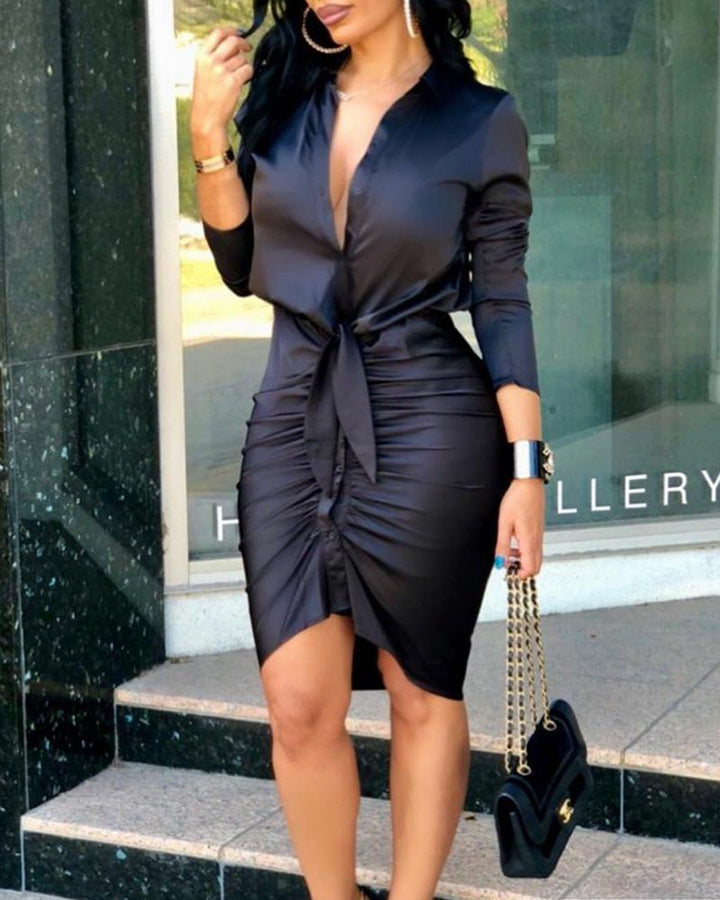 Woman wearing satin midi shirt dress