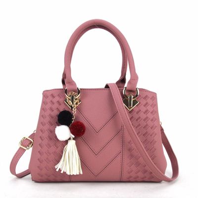 Embossed handbag with pompom charm