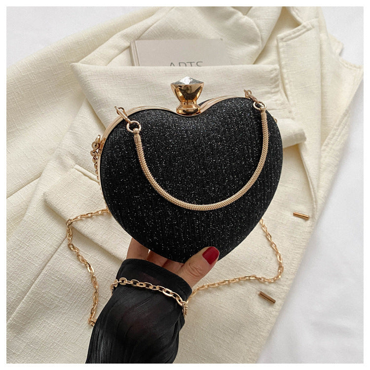 Heart-shaped metallic clutch with chain