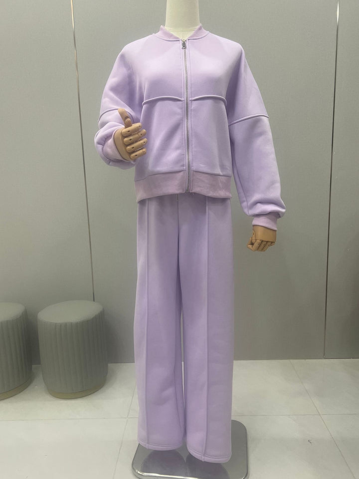 Woman in a zip jacket and wide-leg pants set
