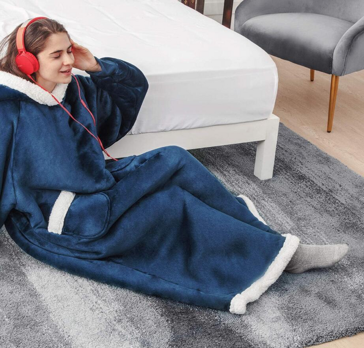 Oversized sherpa hoodie blanket on the couch