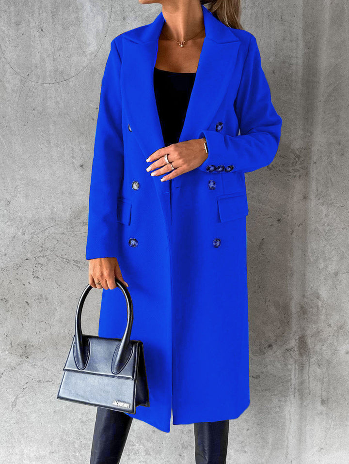 Woman in long double-breasted coat