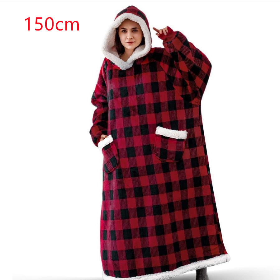Oversized sherpa hoodie blanket on the couch